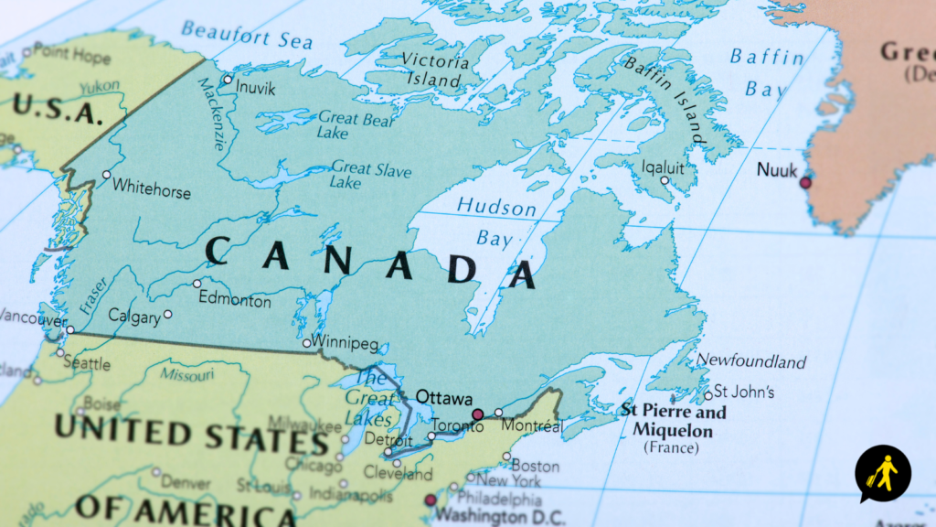 Map of Canada showing Canada in a forest green, the USA in a light green and the left half of Greenland in a washed-out orange.