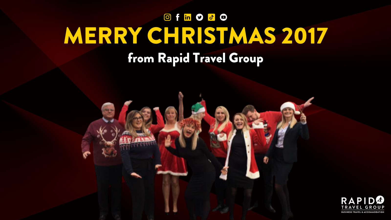 Merry Christmas 2017 from Rapid Travel Group . Photo shows the team dressed in Christmas outfits.